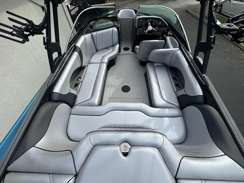 Slide: The Image of 2024 Sanger V237 SX boat interior with sleek gray seating and modern design. - 6