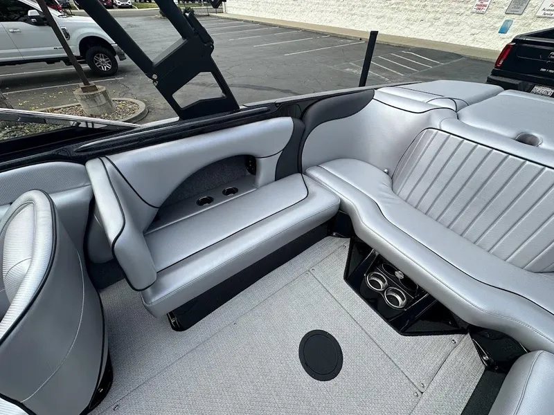 Slide: The Image of 2024 Sanger V237 SX boat interior with sleek gray seating and modern design. - 8
