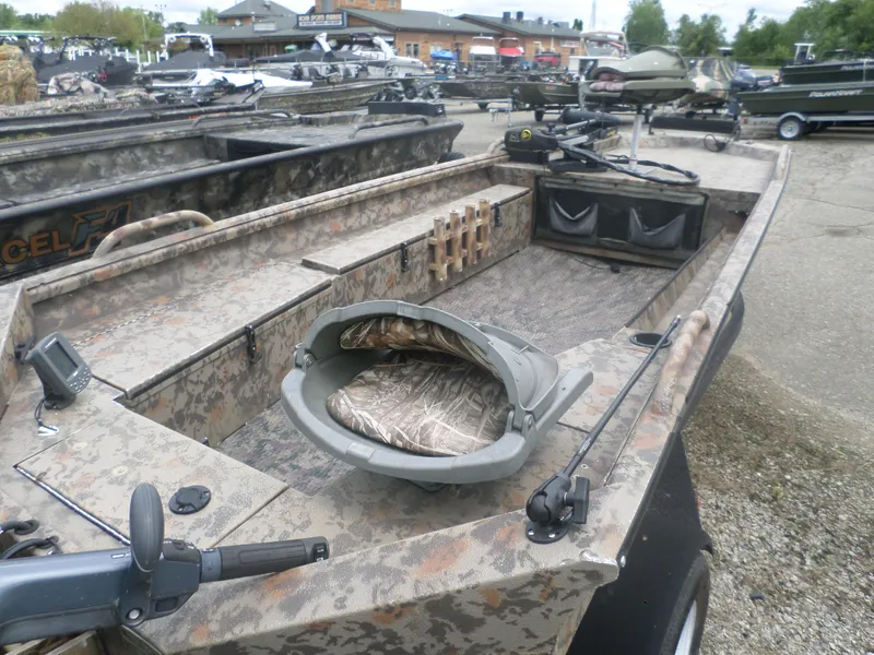 Slide: The Image of 2012 Excel 1751 VF4 camo fishing boat with swivel seat and equipment. - 3