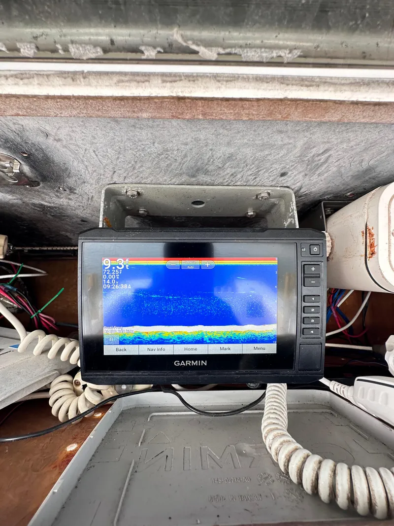 Slide: The Image of Garmin fishfinder on 1988 Ocean Master 31 Center Console boat. - 11