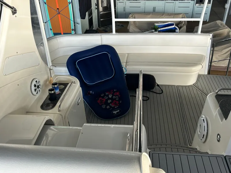 Slide: The Image of 2008 Cruisers 395 Motoryacht interior with seating and deck area. - 10