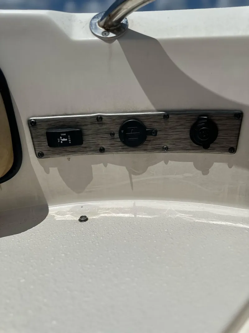 Slide: The Image of Control panel on a 2023 Carolina Skiff 24 Ultra Elite boat. - 14