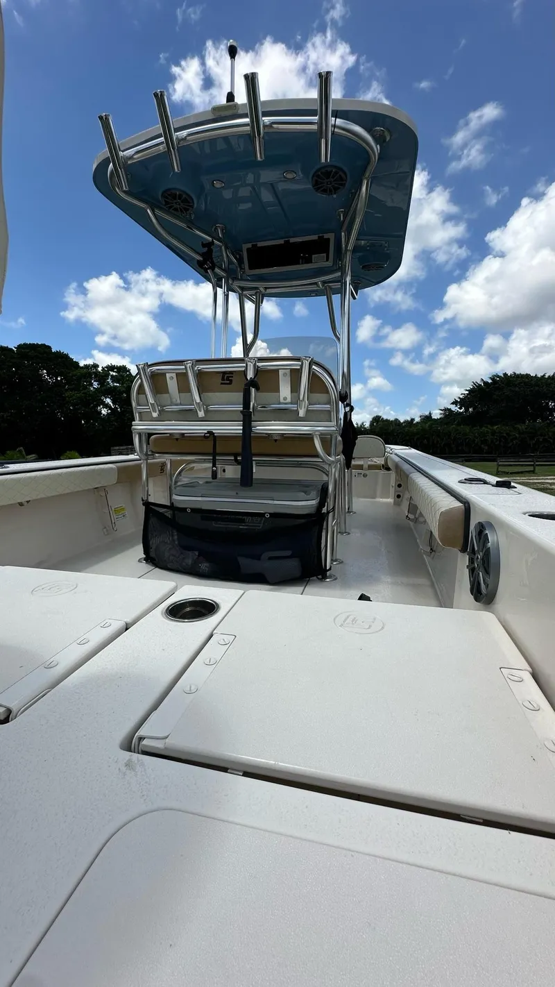 Slide: The Image of 2023 Carolina Skiff 24 Ultra Elite boat with T-top and seating. - 30