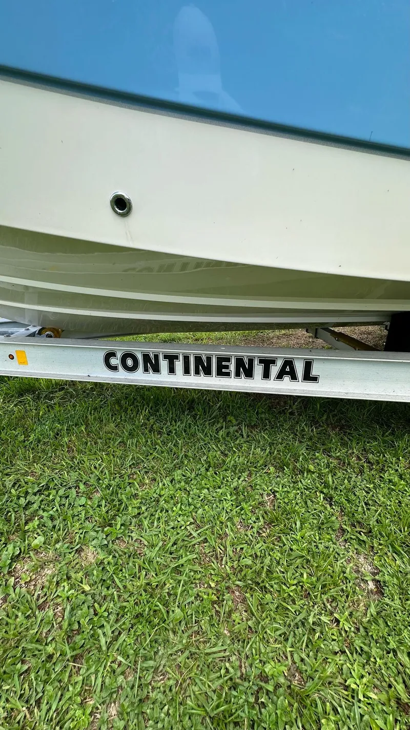 Slide: The Image of 2023 Carolina Skiff 24 Ultra Elite boat on Continental trailer. - 36