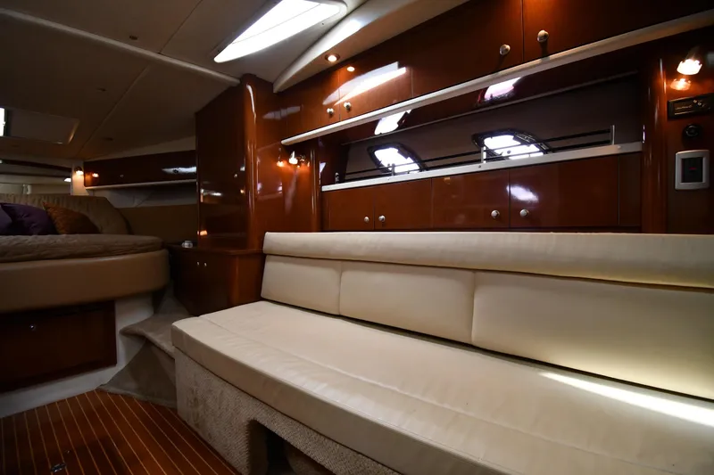 Slide: The Image of Luxurious interior of 2009 Sea Ray 330 Sundancer yacht with elegant seating and wood finishes. - 30