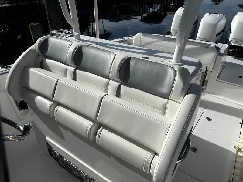Slide: The Image of 2021 Nor-Tech 390 Sport Center Console boat seating and deck area. - 14