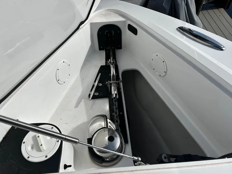 Slide: The Image of Anchor compartment of 2021 Nor-Tech 390 Sport Center Console boat. - 19