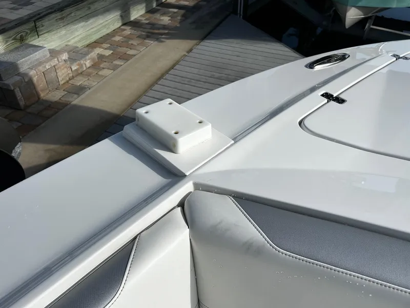 Slide: The Image of 2021 Nor-Tech 390 Sport Center Console boat detail at dock. - 20