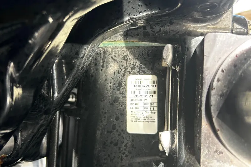 Slide: The Image of Close-up of a 2021 Nor-Tech 390 Sport Center Console engine label. - 25