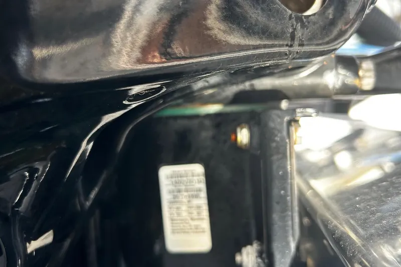 Slide: The Image of Close-up of the 2021 Nor-Tech 390 Sport Center Console engine compartment. - 26