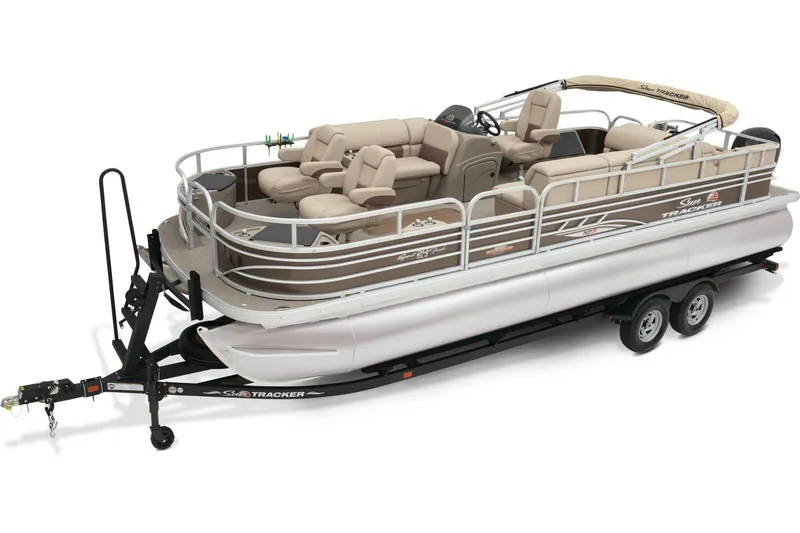 The Image of 2023 Sun Tracker Sportfish 24 XP3 pontoon boat on trailer, parked outdoors. - 0
