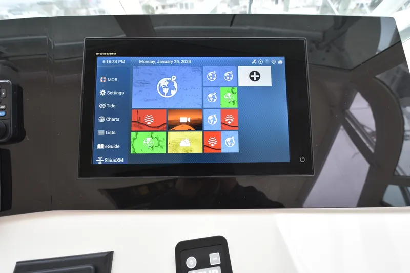 Slide: The Image of Touchscreen navigation system on a 2006 Albemarle 41 Express boat. - 25