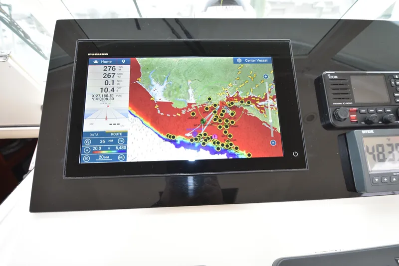 Slide: The Image of Navigation system on a 2006 Albemarle 41 Express boat displaying a detailed marine map. - 26