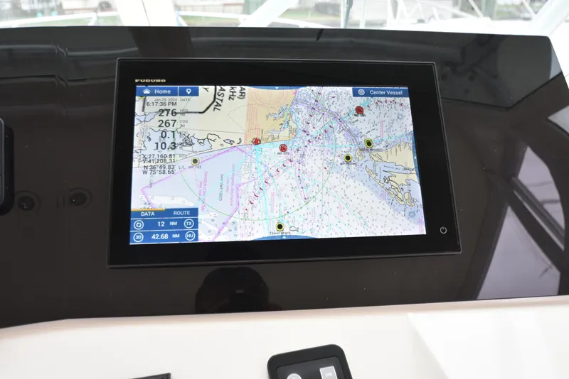 Slide: The Image of Navigation display on a 2006 Albemarle 41 Express boat showing a detailed marine chart. - 29