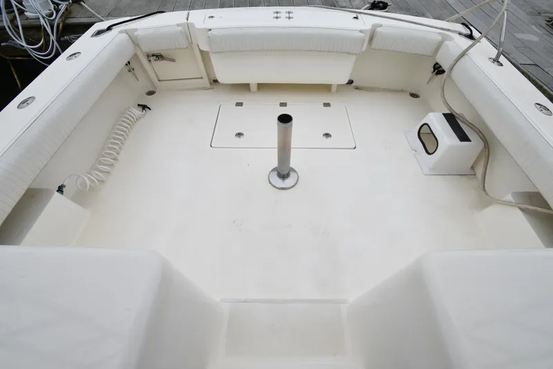 Slide: The Image of 2006 Albemarle 41 Express boat deck with seating and storage compartments. - 36