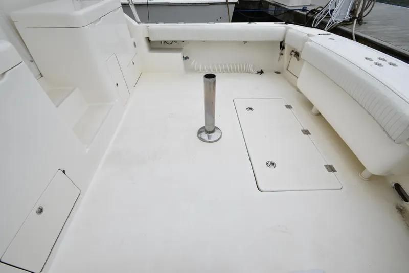 Slide: The Image of 2006 Albemarle 41 Express boat deck with storage compartments and seating. - 37