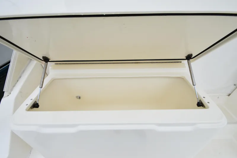 Slide: The Image of Open storage compartment on a 2006 Albemarle 41 Express boat. - 40