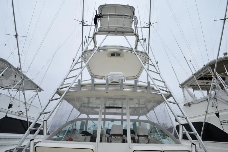 Slide: The Image of 2006 Albemarle 41 Express boat with tower and outriggers. - 42