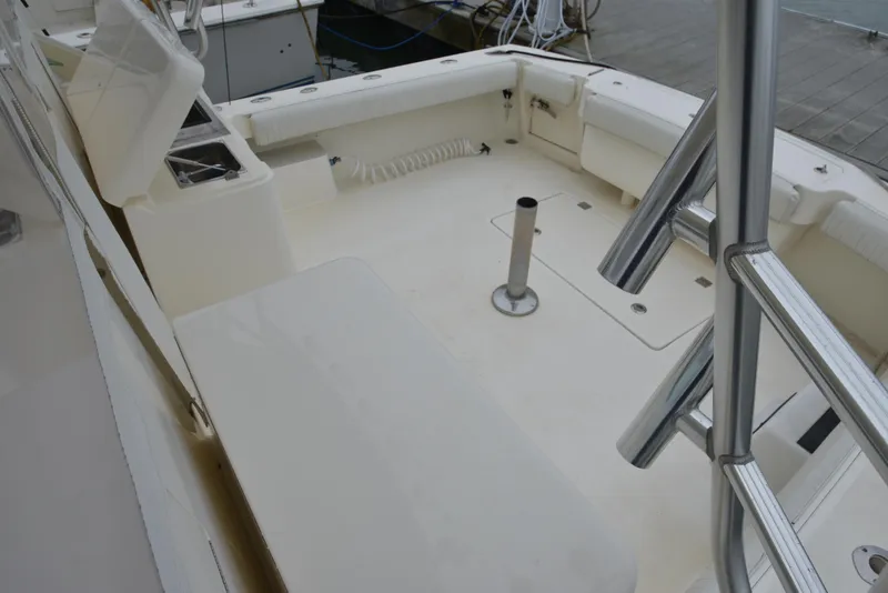 Slide: The Image of 2006 Albemarle 41 Express boat deck with seating and storage compartments. - 48