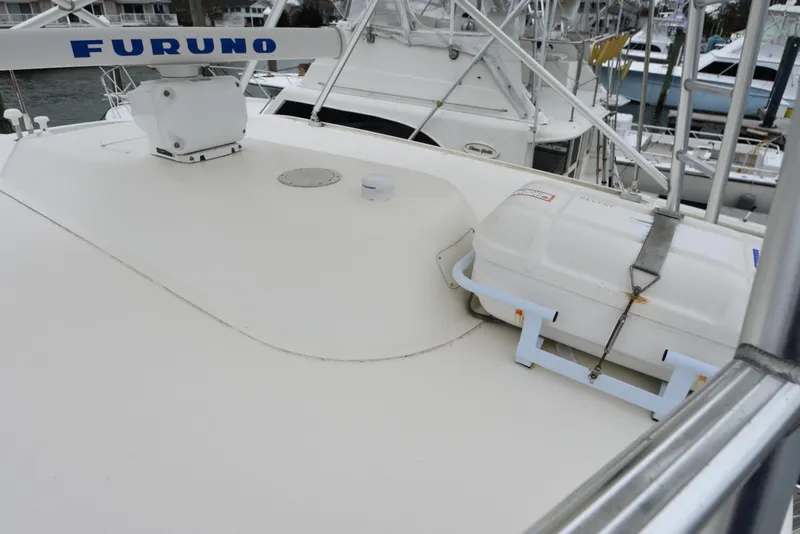 Slide: The Image of 2006 Albemarle 41 Express boat deck with Furuno radar and safety equipment. - 49