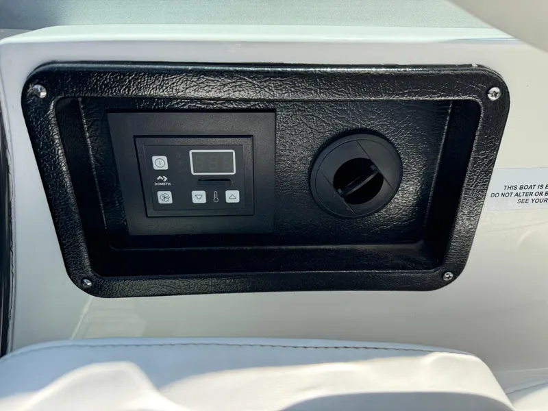Slide: The Image of Control panel on a 2019 Monterey 335 SY boat dashboard. - 12