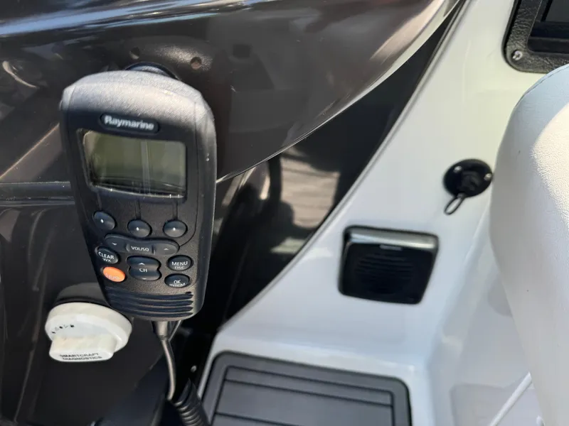 Slide: The Image of Close-up of a Raymarine marine radio on a 2019 Monterey 335 SY boat. - 13