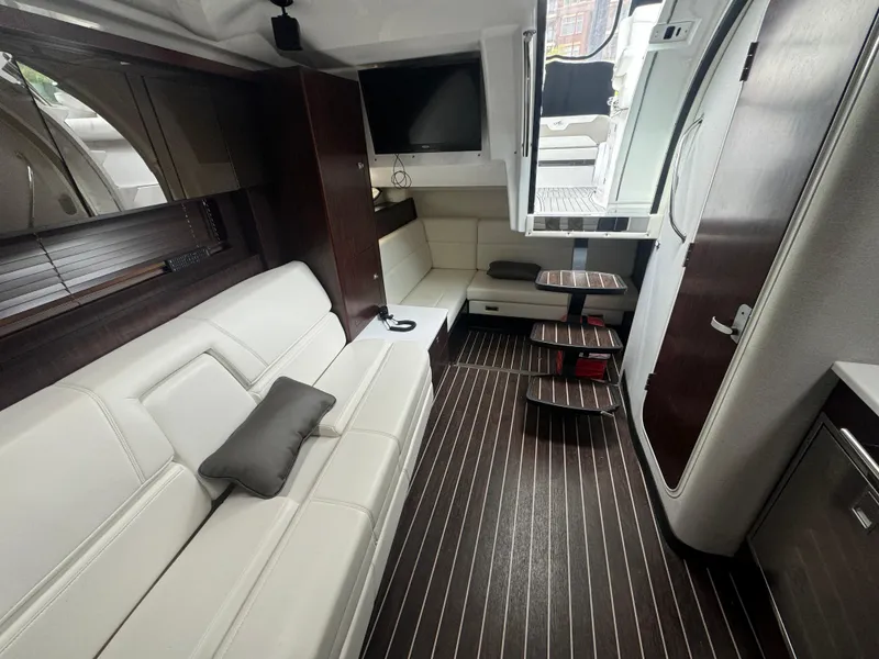 Slide: The Image of Luxurious interior of a 2019 Monterey 335 SY yacht with sleek seating and modern design. - 36
