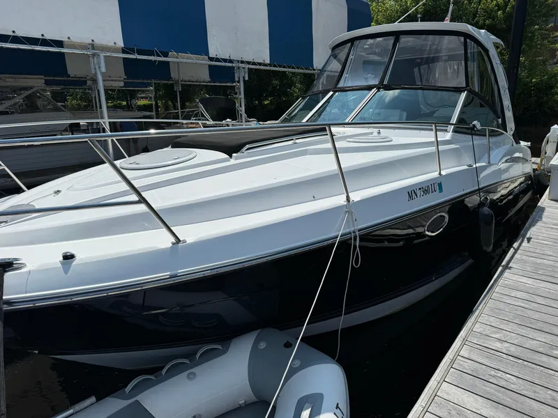 Slide: The Image of 2019 Monterey 335 SY boat docked at marina, featuring sleek design and modern amenities. - 5