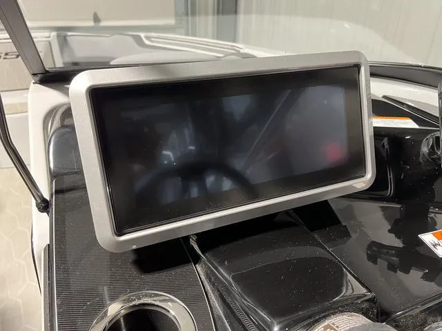 Slide: The Image of 2024 Yamaha Boats 255XE dashboard with touchscreen display. - 21