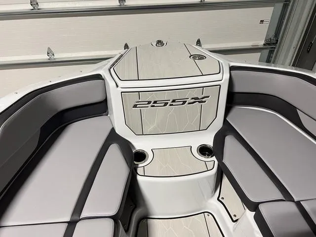Slide: The Image of 2024 Yamaha Boats 255XE interior with sleek seating and modern design. - 28