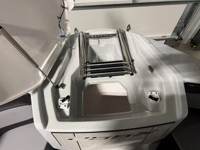 Slide: The Image of 2024 Yamaha Boats 255XE swim platform with foldable ladder. - 29