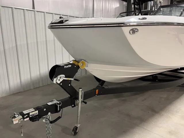 Slide: The Image of 2024 Yamaha Boats 255XE on trailer in indoor storage facility. - 3