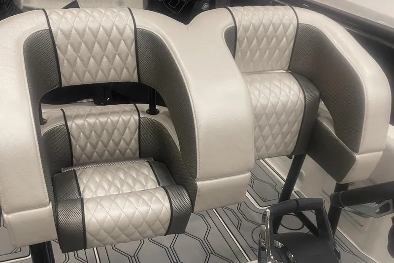 Slide: The Image of Luxury seating on the 2025 Hustler 25 C3 Speedfish boat with diamond-stitched upholstery. - 16