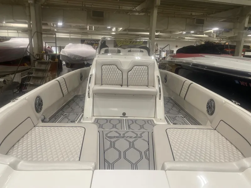 Slide: The Image of 2025 Hustler 25 C3 Speedfish boat interior with luxurious seating and modern design. - 6