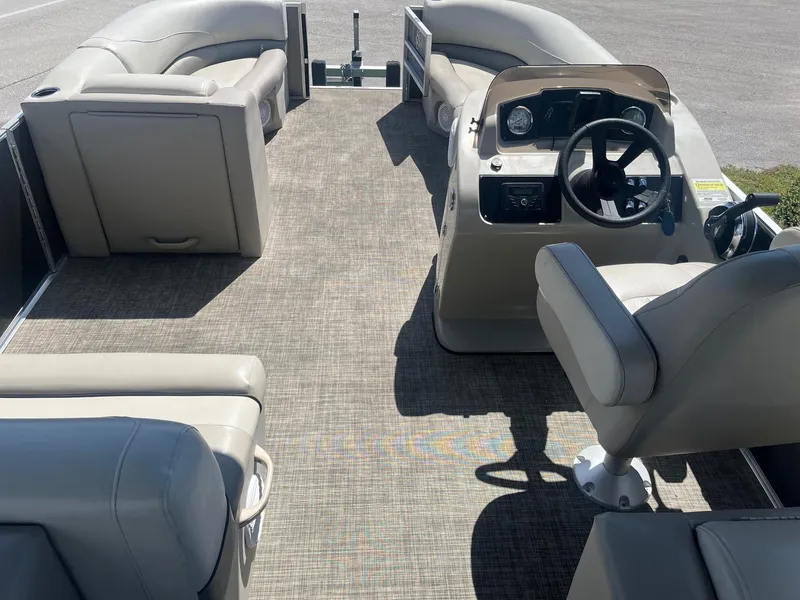 Slide: The Image of 2022 Cypress Cay Seabreeze 232 pontoon boat interior with plush seating. - 5