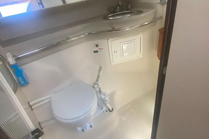 Slide: The Image of Catalina 470 2007 yacht bathroom with toilet and sink. - 46