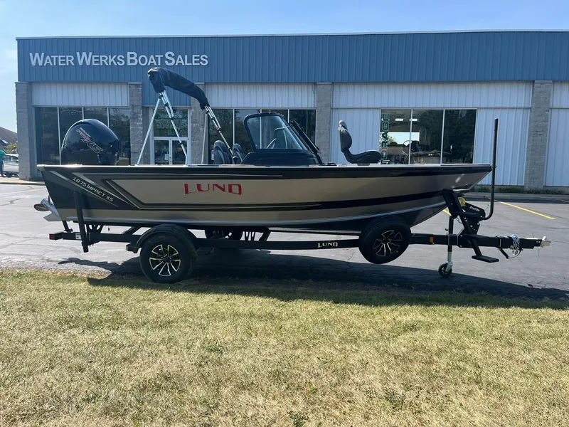 Slide: The Image of 2025 Lund 1875 Impact XS Sport boat at Water Werks Boat Sales. - 2