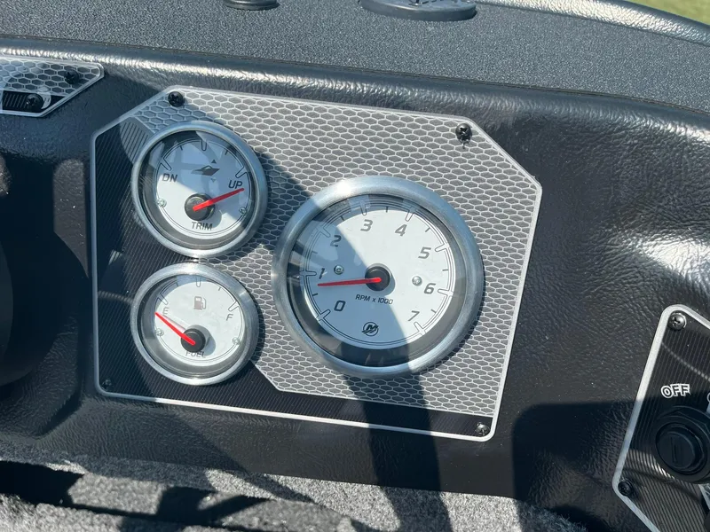 Slide: The Image of Dashboard gauges of 2025 Lund 1875 Impact XS Sport boat. - 25