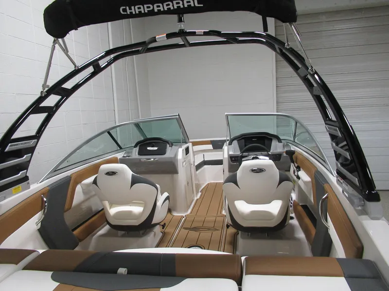 Slide: The Image of 2024 Chaparral 21 SSi boat interior with modern seating and sleek design. - 3