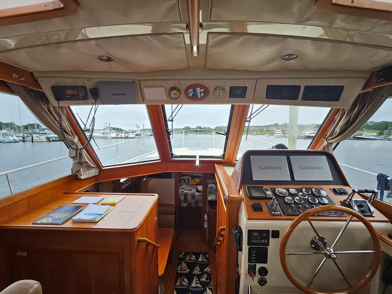 Slide: The Image of Interior view of 2007 Grand Banks 39 Eastbay SX yacht cockpit with navigation equipment. - 12