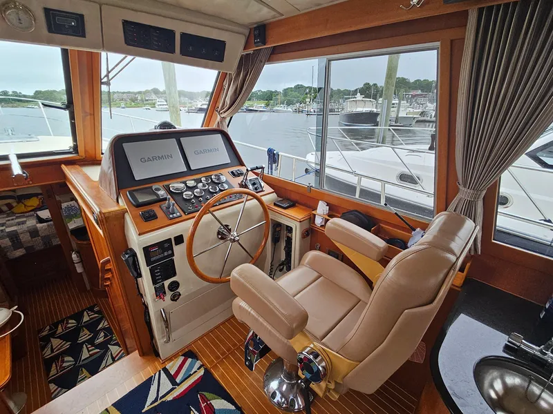 Slide: The Image of 2007 Grand Banks 39 Eastbay SX helm with leather seat and navigation equipment. - 13