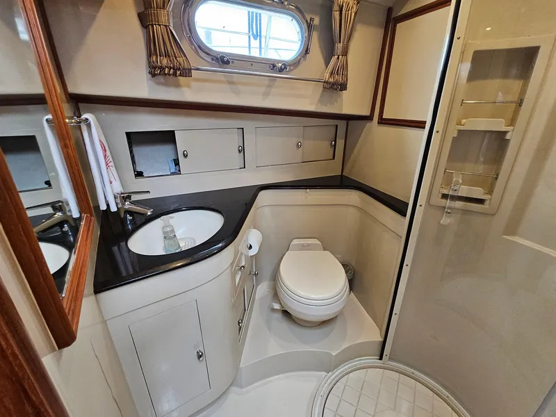 Slide: The Image of Luxurious 2007 Grand Banks 39 Eastbay SX yacht bathroom with modern amenities. - 16