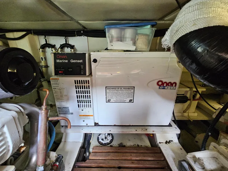 Slide: The Image of Onan marine generator in 2007 Grand Banks 39 Eastbay SX engine room. - 25
