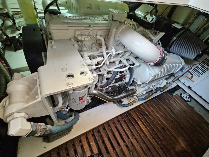 Slide: The Image of Engine room of 2007 Grand Banks 39 Eastbay SX, showcasing detailed mechanical components. - 28