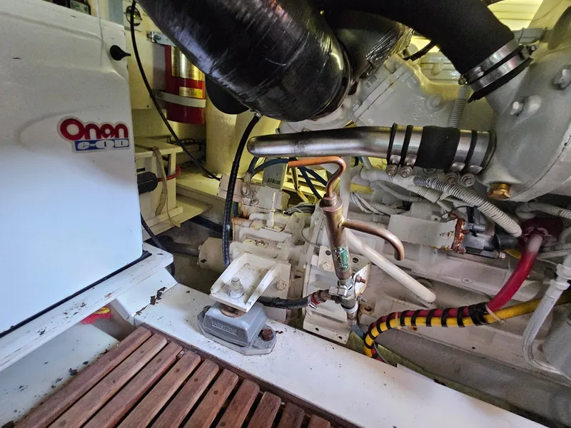 Slide: The Image of Engine room of 2007 Grand Banks 39 Eastbay SX with Onan generator and mechanical components. - 29