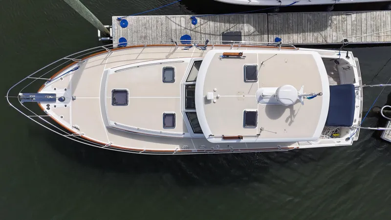 Slide: The Image of Aerial view of 2007 Grand Banks 39 Eastbay SX yacht docked at a marina. - 3