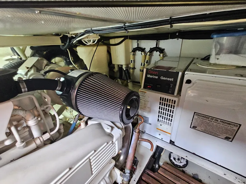 Slide: The Image of Engine room of 2007 Grand Banks 39 Eastbay SX with marine generator and components. - 30