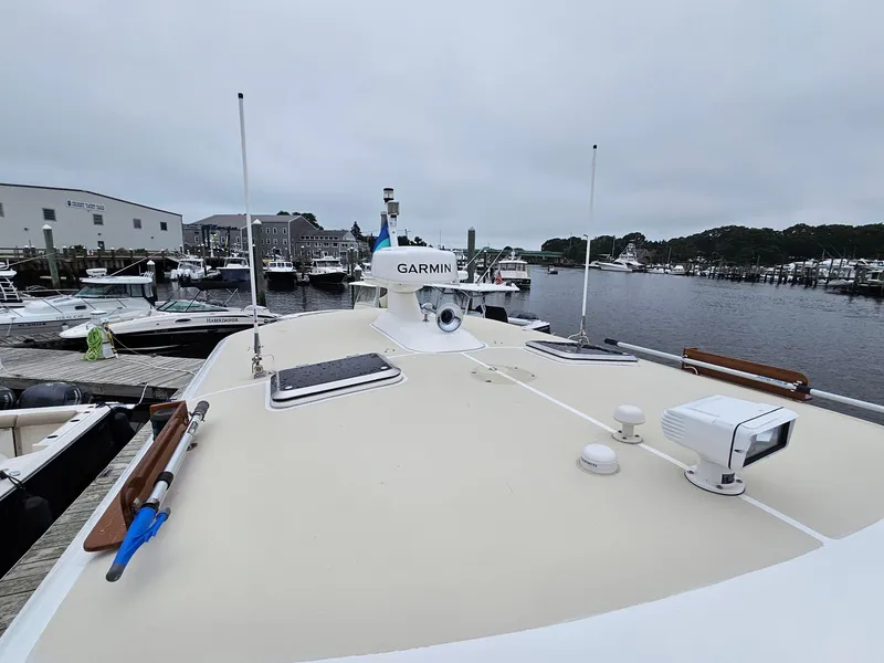 Slide: The Image of 2007 Grand Banks 39 Eastbay SX yacht docked at marina, featuring Garmin equipment. - 4
