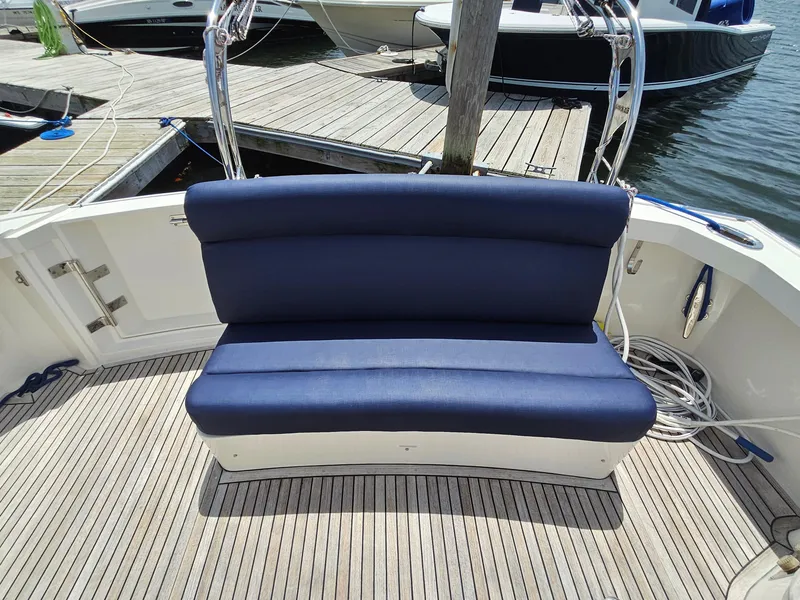 Slide: The Image of Blue cushioned bench on 2007 Grand Banks 39 Eastbay SX yacht deck. - 8