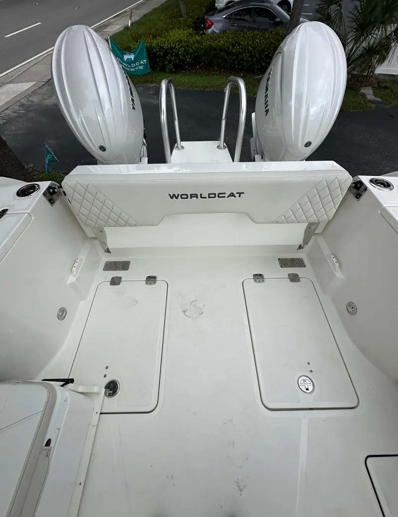 Slide: The Image of 2025 World Cat 260 DC-X boat deck with dual engines and spacious layout. - 13